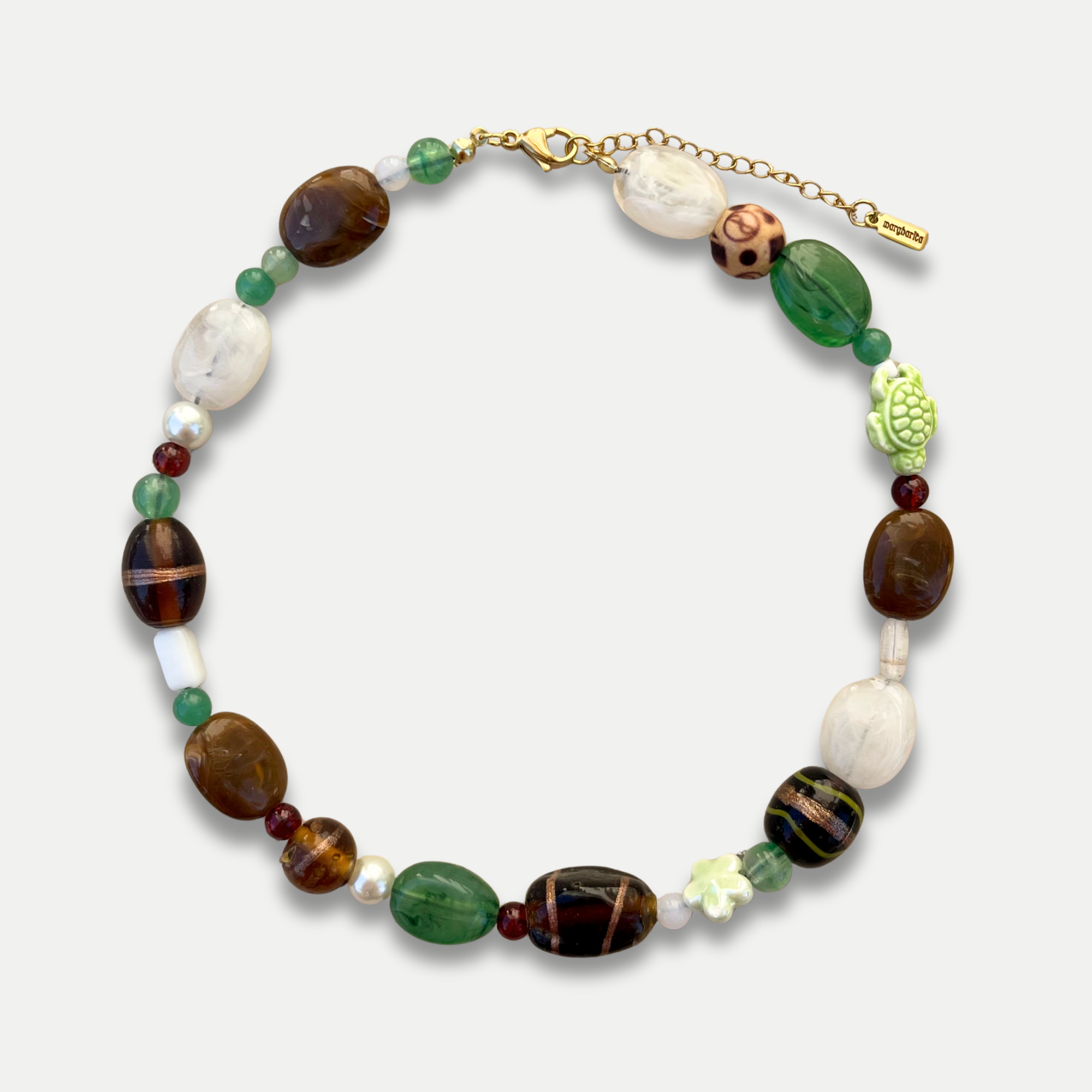 COLLIER HISTORÍA VERT - PACKSHOT