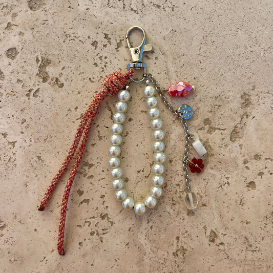 GRIGRI DE SAC ARGENT ROUGE ET BLANC - PRODUIT